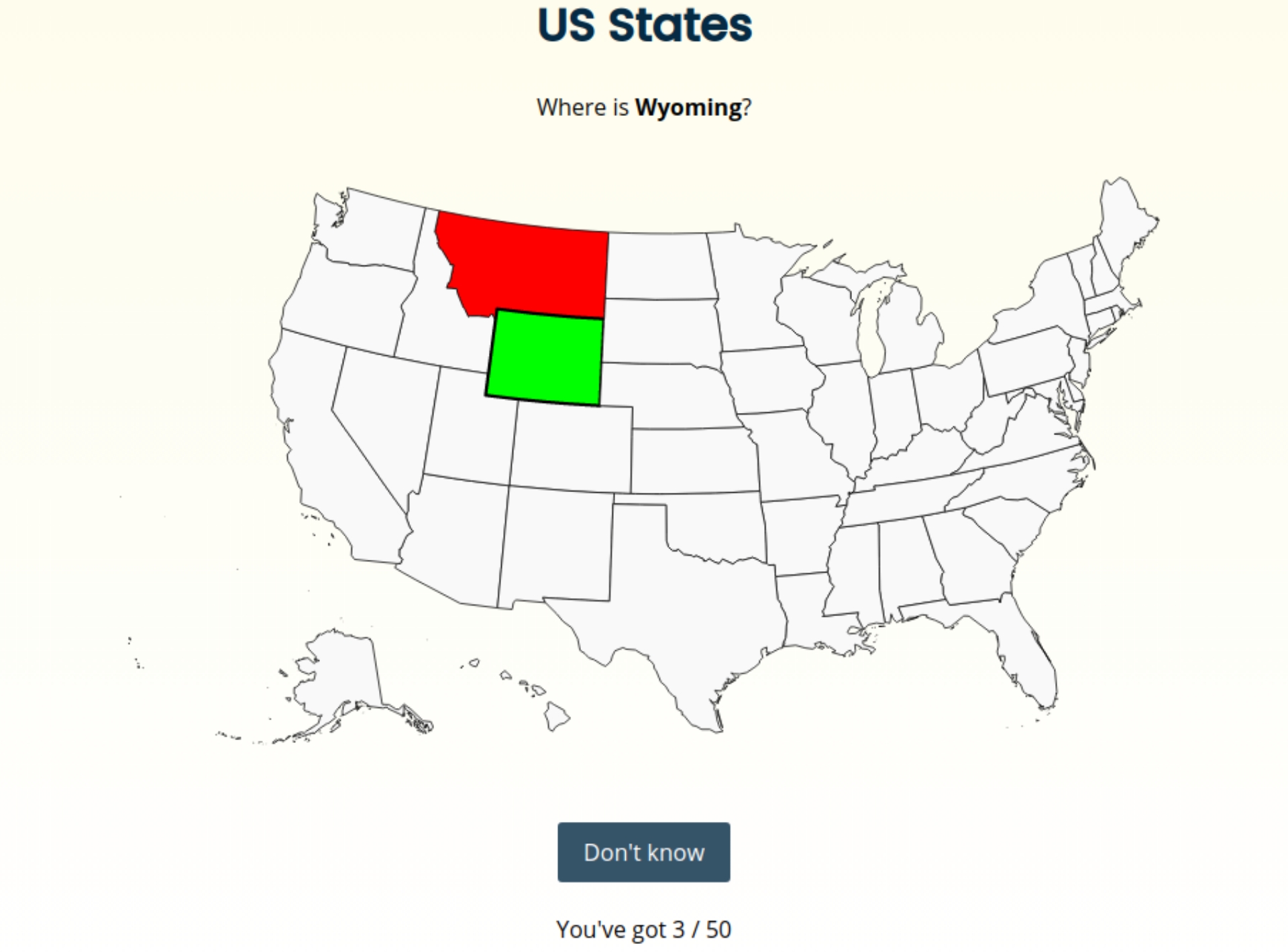 Screenshot of someone finding Wisconsin on a map - it's highlighted in green, but Montana's in red after they made a mistake.